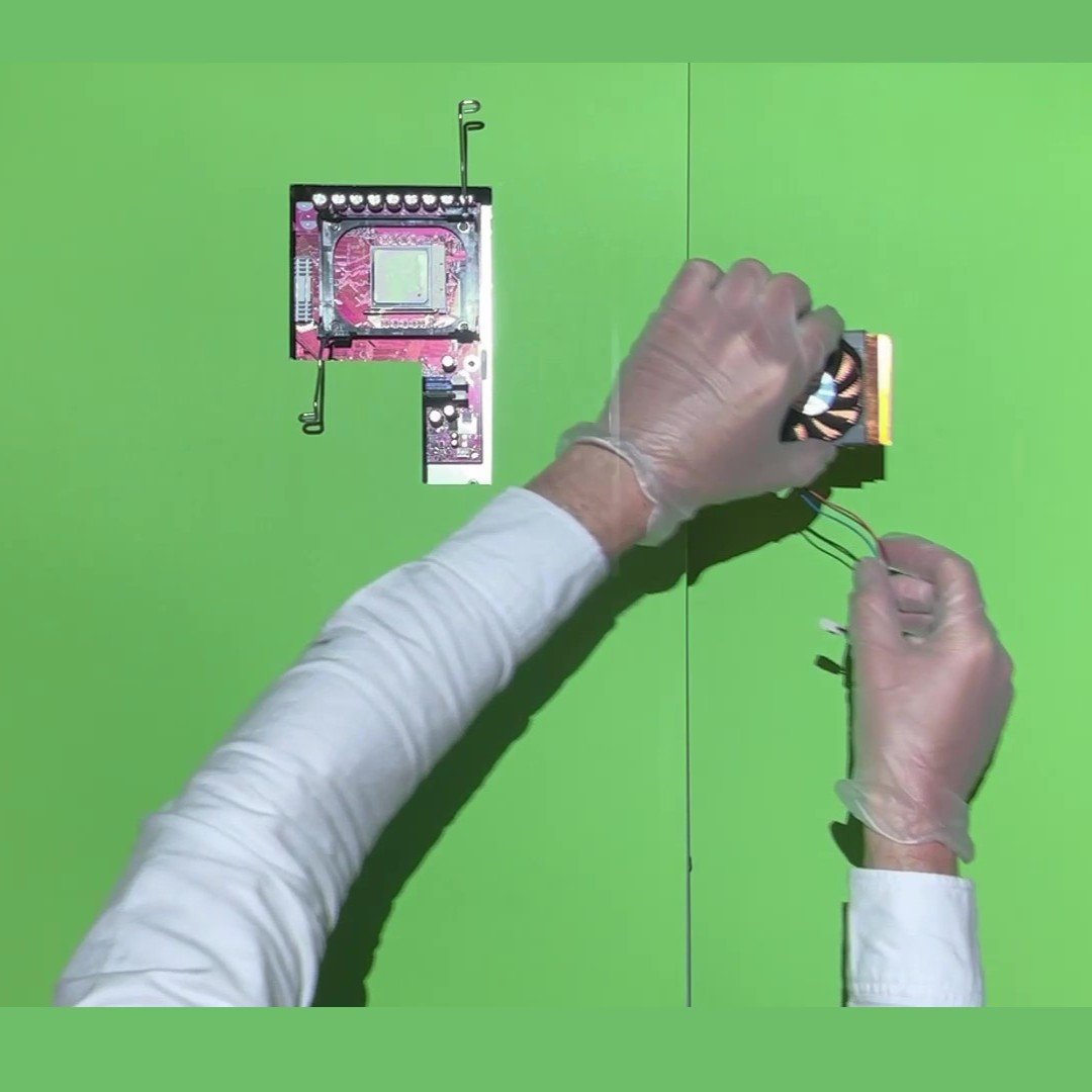 Green-screen instructional overlay projected onto a server